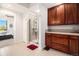 A full bathroom features wooden cabinets and a glass shower stall at 1699 N Downing St # 302, Denver, CO 80218