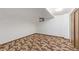 Unfinished basement with patterned carpeting and minimal natural light at 11237 W 59Th Ave, Arvada, CO 80004
