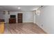 Finished basement with wood flooring, a vintage dresser, and natural light at 11237 W 59Th Ave, Arvada, CO 80004