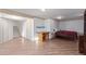 Finished basement offering wood flooring, recessed lighting, and a potential bedroom area at 11237 W 59Th Ave, Arvada, CO 80004