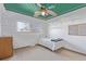 Bedroom showcasing baseball-themed ceiling, a single bed, window, and a baseball fan's decor at 11237 W 59Th Ave, Arvada, CO 80004