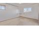 Bright bedroom with ample natural light and carpet flooring at 11237 W 59Th Ave, Arvada, CO 80004