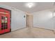 Bright bedroom featuring a red telephone booth mural and carpet flooring at 11237 W 59Th Ave, Arvada, CO 80004