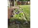 Charming flowerbed with rock borders, lush greenery, and colorful blooms at 11237 W 59Th Ave, Arvada, CO 80004