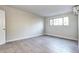 Bright bedroom with tile floors, a window, and neutral wall color at 600 Manhattan Dr # 4C, Boulder, CO 80303