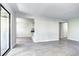 Bright living room featuring tile flooring, fresh paint, and open floor plan at 600 Manhattan Dr # 4C, Boulder, CO 80303