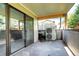 Outdoor patio with sliding glass doors, grill and air conditioning unit at 600 Manhattan Dr # 4C, Boulder, CO 80303