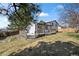 Spacious backyard featuring deck and mature trees at 8334 Allison Ct, Arvada, CO 80005