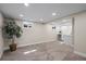 Spacious finished basement featuring neutral carpet and walls, recessed lighting and modern touches at 8334 Allison Ct, Arvada, CO 80005
