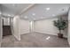 Finished basement featuring neutral carpet and walls, recessed lighting and modern touches at 8334 Allison Ct, Arvada, CO 80005