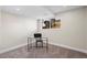 Finished basement with neutral walls, carpet, modern desk and a window allowing for natural light at 8334 Allison Ct, Arvada, CO 80005