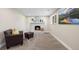 Finished basement with a cozy fireplace and comfortable seating area, perfect for relaxation at 8334 Allison Ct, Arvada, CO 80005