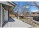Backyard deck featuring wooden railings and painted surface at 8334 Allison Ct, Arvada, CO 80005