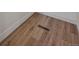 Close up of hardwood-style flooring with a vent at 8334 Allison Ct, Arvada, CO 80005