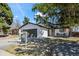Charming single-Gathering home with a well-maintained lawn, a two car garage, and a cozy front porch at 8334 Allison Ct, Arvada, CO 80005