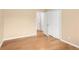 Bright bedroom with hardwood floors and closet space for storage at 4545 E Harvard Ave, Denver, CO 80222