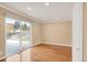 Living room featuring hardwood floors and a sliding glass door, offering great natural light at 4545 E Harvard Ave, Denver, CO 80222