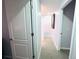 Hallway view with carpet and white walls at 12223 E Ford E Ave # 12223, Aurora, CO 80012