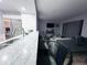 Bright modern kitchen with stainless steel appliances and a breakfast bar for casual dining at 12223 E Ford E Ave # 12223, Aurora, CO 80012