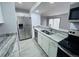 Modern kitchen with stainless steel appliances and granite countertops at 12223 E Ford E Ave # 12223, Aurora, CO 80012