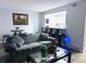Comfortable living area with seating, decor and a view to the kitchen at 12223 E Ford E Ave # 12223, Aurora, CO 80012