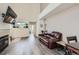 Comfortable living room with a fireplace, plush sofa, and an open layout at 2541 S Bahama Cir # F, Aurora, CO 80013