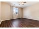 Spacious bedroom with dark hardwood floors and window coverings at 3564 S Jebel Cir, Aurora, CO 80013