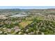 Beautiful aerial view of the neighborhood, showcasing the lush greenery and community lake at 4912 Indiana St, Golden, CO 80403