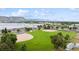 Beautiful aerial view of a green sports field with mountains in the background at 4912 Indiana St, Golden, CO 80403