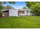 View of the property's backyard and detached garage at 4912 Indiana St, Golden, CO 80403