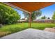 View of the home's expansive backyard with a covered patio perfect for outdoor entertaining and relaxing at 4912 Indiana St, Golden, CO 80403