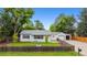 Charming single-story home with a fenced yard and detached garage, perfect for families at 4912 Indiana St, Golden, CO 80403