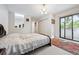 Carpeted bedroom with a large rug and sliding glass doors to the balcony at 1254 S Yosemite Way # 99, Denver, CO 80247