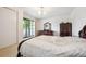 Spacious main bedroom with carpet, furniture, closet and sliding door to balcony at 1254 S Yosemite Way # 99, Denver, CO 80247