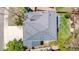 Drone shot showcasing the roof of a well-maintained house, complemented by lush greenery and neighborhood surroundings at 1041 Riddlewood Rd, Highlands Ranch, CO 80129