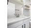 Updated bathroom featuring quartz countertops and modern fixtures at 1041 Riddlewood Rd, Highlands Ranch, CO 80129