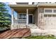 Charming front porch and well-maintained landscaping at 1041 Riddlewood Rd, Highlands Ranch, CO 80129