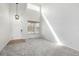 Bright living room boasts soaring ceilings and natural light at 1041 Riddlewood Rd, Highlands Ranch, CO 80129