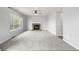 Open living room with fireplace at 1041 Riddlewood Rd, Highlands Ranch, CO 80129