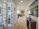 Inviting hallway with neutral tones and wood flooring leads to a comfortable living area at 188 S Waterloo St, Aurora, CO 80018
