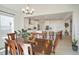 Inviting dining area open to the spacious kitchen with island and stainless steel appliances at 188 S Waterloo St, Aurora, CO 80018