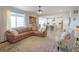 Inviting living room featuring modern decor, a large window, and an open layout at 188 S Waterloo St, Aurora, CO 80018