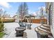 Fenced backyard with firepit, patio, and pergola at 3050 N Gaylord St, Denver, CO 80205