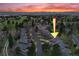 Aerial view highlighting the home's location within a lush, landscaped community with mountain views at 6300 W Mansfield Ave # 61, Denver, CO 80235