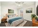 Inviting bedroom featuring decorous neutral colored walls and plenty of natural light at 6300 W Mansfield Ave # 61, Denver, CO 80235