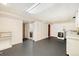 Finished basement laundry room with folding doors, and a full washer and dryer at 6300 W Mansfield Ave # 61, Denver, CO 80235
