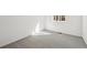 Bedroom featuring neutral walls, base molding, carpeting, and window at 24739 E 39Th Ave, Aurora, CO 80019