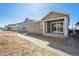 Exterior view of a newly constructed neighborhood with uniform architecture and landscaping at 24739 E 39Th Ave, Aurora, CO 80019