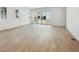 Bright living room with wide sliding doors and sleek flooring at 24739 E 39Th Ave, Aurora, CO 80019