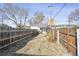 Fenced backyard features a detached garage and plenty of space for outdoor activities at 2731 W 32Nd Ave, Denver, CO 80211